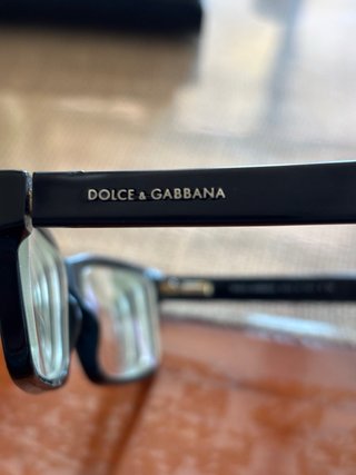 Occhiali Dolce & Gabbana neri con dettagli oro
