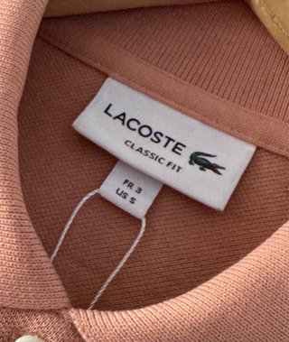 Polo Lacoste Miami Open Rosa salmón 100% original.