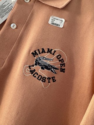 Polo Lacoste Miami Open Rosa salmón 100% original.