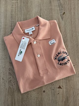 Polo Lacoste Miami Open Rosa salmón 100% original.