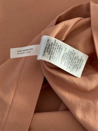Polo Lacoste Miami Open Rosa salmón 100% original.