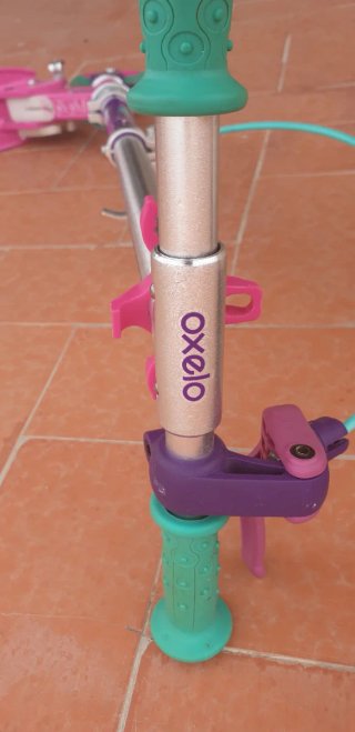 Patinete Oxelo rosa y morado