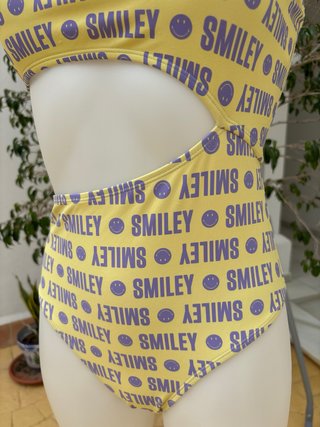 Triquini Smiley wordl