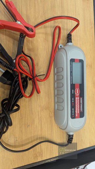 Dino - Cargador de batería con comprobador de batería