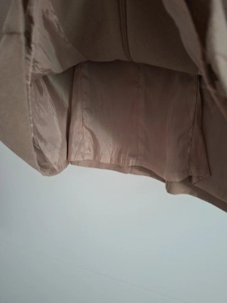 Chaleco efecto piel beige