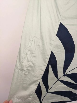 Vestido de verano verde menta con hojas