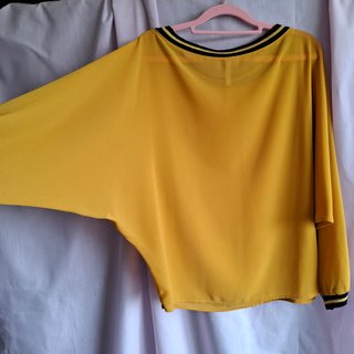 Blusa Lumina manga murciélago semitransparente