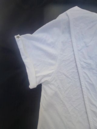 Camiseta  Blanca Talla L. Medidas en descripción