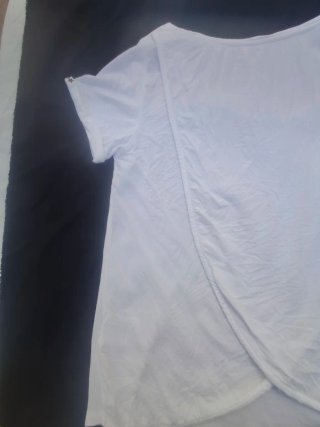 Camiseta  Blanca Talla L. Medidas en descripción