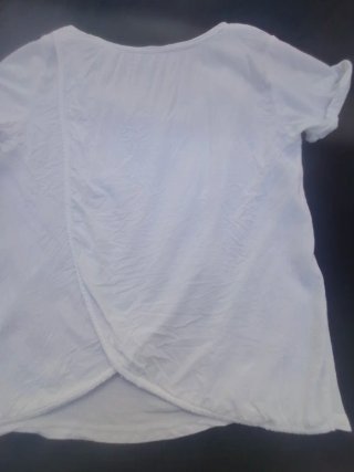 Camiseta  Blanca Talla L. Medidas en descripción