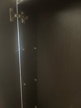 Armario baño pared madera oscuro