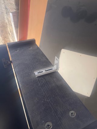 Armario baño pared madera oscuro