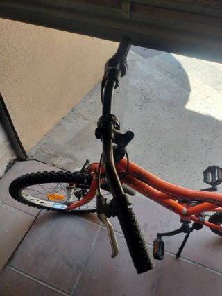 Bicicleta naranja Orbea poco uso
