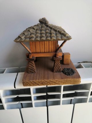 Casa de madera miniatura