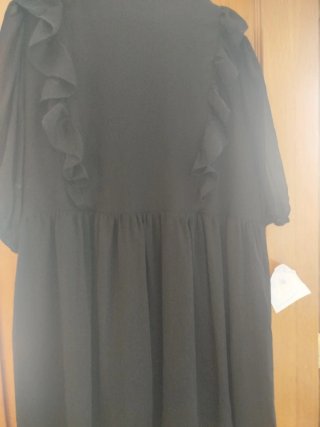 Vestido negro con transparència
