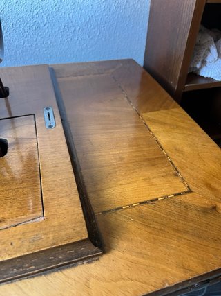 Máquina de coser Singer 15K antigua con mueble
