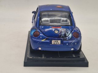 VOLKSWAGEN New Beetle Space - Burago - Scala 1/18