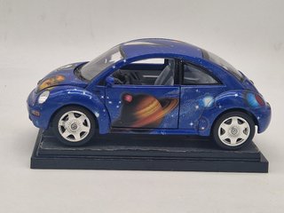 VOLKSWAGEN New Beetle Space - Burago - Scala 1/18