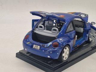VOLKSWAGEN New Beetle Space - Burago - Scala 1/18