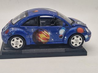 VOLKSWAGEN New Beetle Space - Burago - Scala 1/18