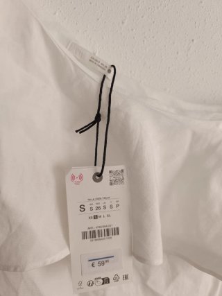 Vestido asimétrico midi lino volantes