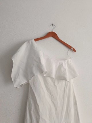 Vestido asimétrico midi lino volantes