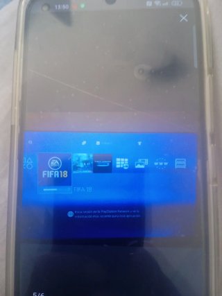 PS4 (PlayStation 4) con 1 mando y 10 juegos