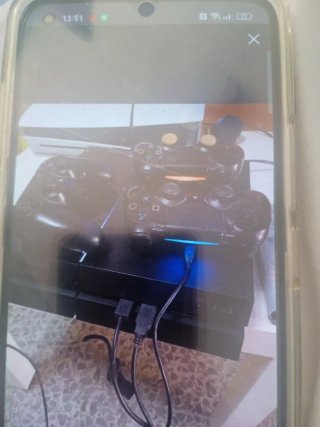 PS4 (PlayStation 4) con 1 mando y 10 juegos