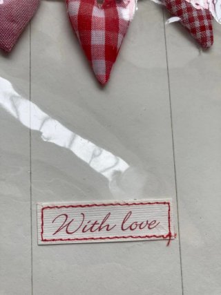 Álbum de fotos nuevo con corazones. 18×18cm