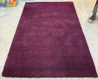 Alfombra púrpura suave