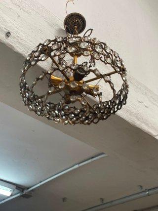 Lámparas antiguas de metal y cristal