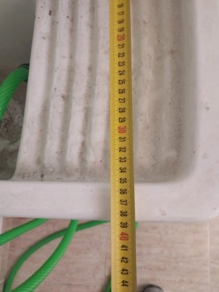 Pila de lavar ropa blanca