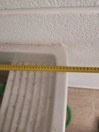 Pila de lavar ropa blanca