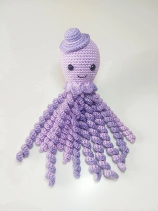 Pulpo crochet bebé sonajero morado Amigurumi