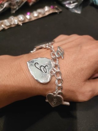 Bracciale Guess con cuori pendenti