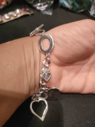 Bracciale Guess con cuori pendenti
