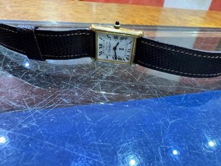 Reloj Cartier Dorado y Marrón original