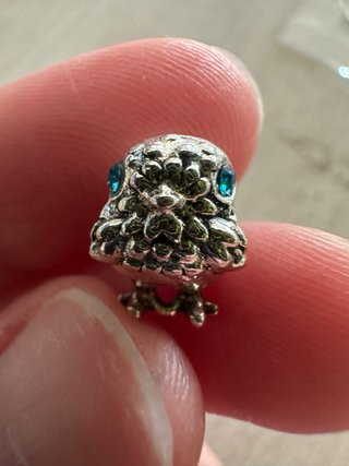Charm uccellino con zirconi blu