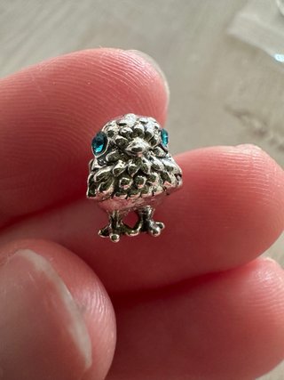 Charm uccellino con zirconi blu