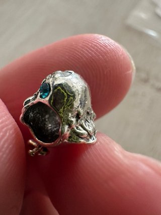 Charm uccellino con zirconi blu