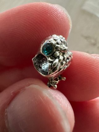 Charm uccellino con zirconi blu