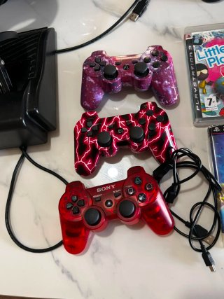 Consola PS3 Negra + Volantes y Juegos