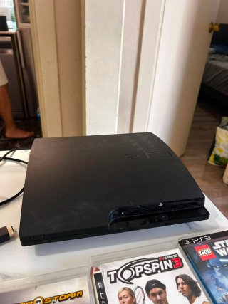 Consola PS3 Negra + Volantes y Juegos