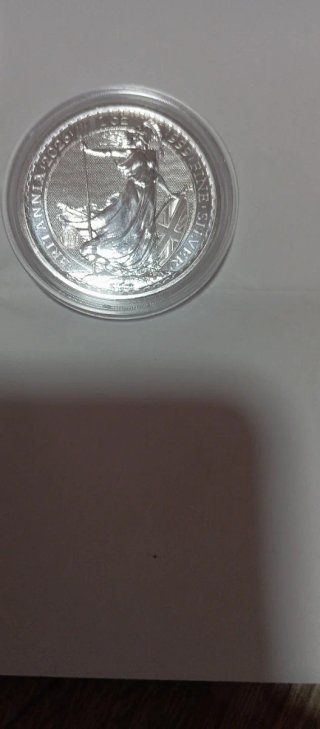 2 monedas1 oz Britannia 1 Maple leaf