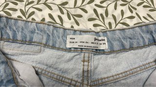 Pantalón corto vaquero desgastado