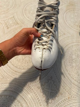 Patines de hielo blancos con protectores