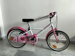 Bicicleta infantil Btwin rosa y blanca