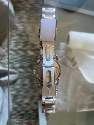 Reloj Lotus Plata y Naranja