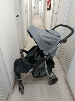 Silla de paseo plegable con plástico de lluvia
