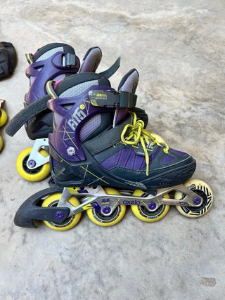 2 pares patines en línea morados y negros